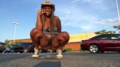 Peeing at crowded Best Buy parking lot.